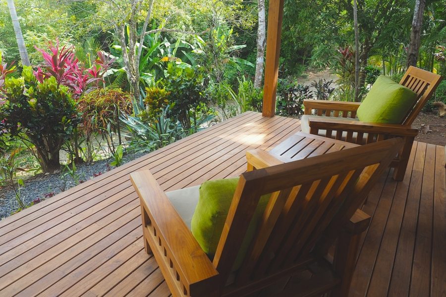 Teak lounge chairs on the Garden Heights Studio deck