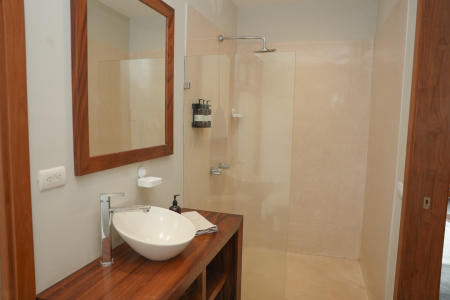 Sunrise Studio bathroom with vessel sink and walk-in shower